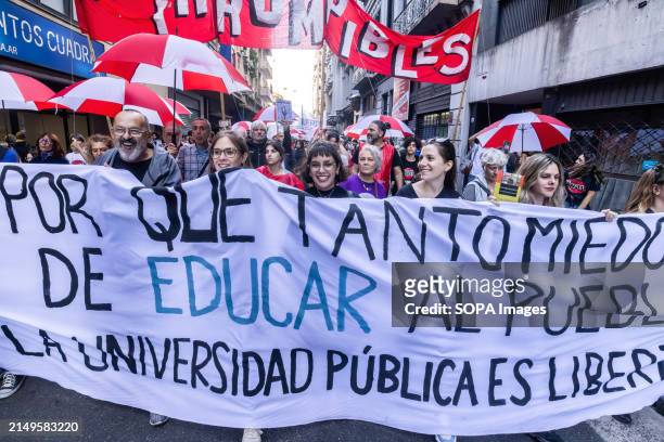 Group of demonstrators chant slogans in favor of public universities carrying a banner during the rally. Protesters in favor of public and free...