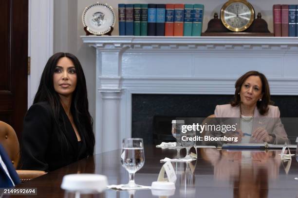 Kim Kardashian, co-founder of SKKY Partners LP, left, and US Vice President Kamala Harris during a Second Chance Month event in the Roosevelt Room of...