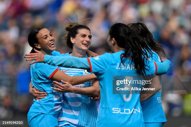 Mallory Swanson of Chicago Red Stars celebrates scoring with teammates in the first half against the Seattle Reign FC at Lumen Field on April 21,...
