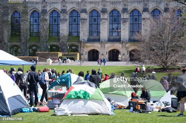 Students set up tents outside Northwestern University as part of an ongoing protest in support of Palestinian rights, demonstrating their commitment...