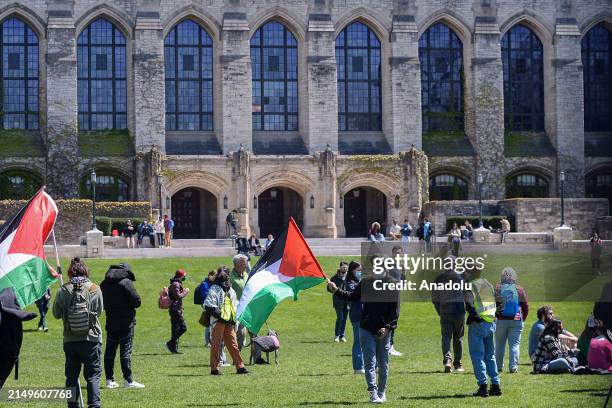 Students set up tents outside Northwestern University as part of an ongoing protest in support of Palestinian rights, demonstrating their commitment...