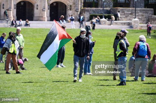 Students set up tents outside Northwestern University as part of an ongoing protest in support of Palestinian rights, demonstrating their commitment...
