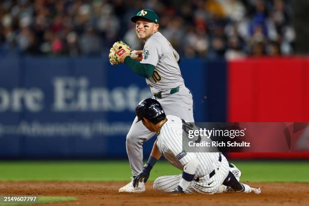 Shortstop Nick Allen of the Oakland Athletics gets a force out on Oswaldo Cabrera of the New York Yankees on a ball hit by Juan Soto of the New York...