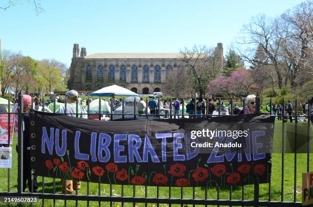 Students set up tents outside Northwestern University as part of an ongoing protest in support of Palestinian rights, demonstrating their commitment...