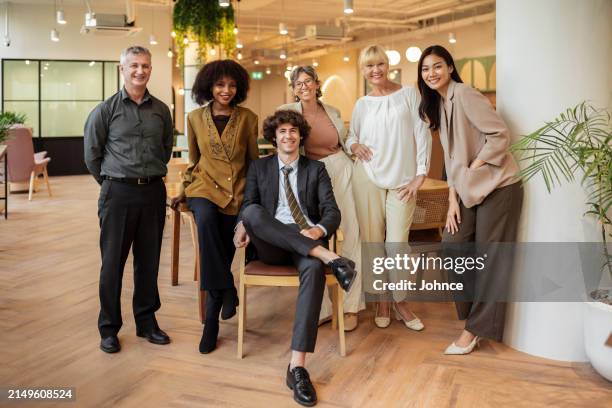 portrait of a smiling business team - generation x stock pictures, royalty-free photos & images
