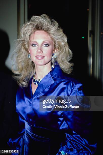 American actress Morgan Fairchild, wearing a blue outfit, United States, circa 1985.