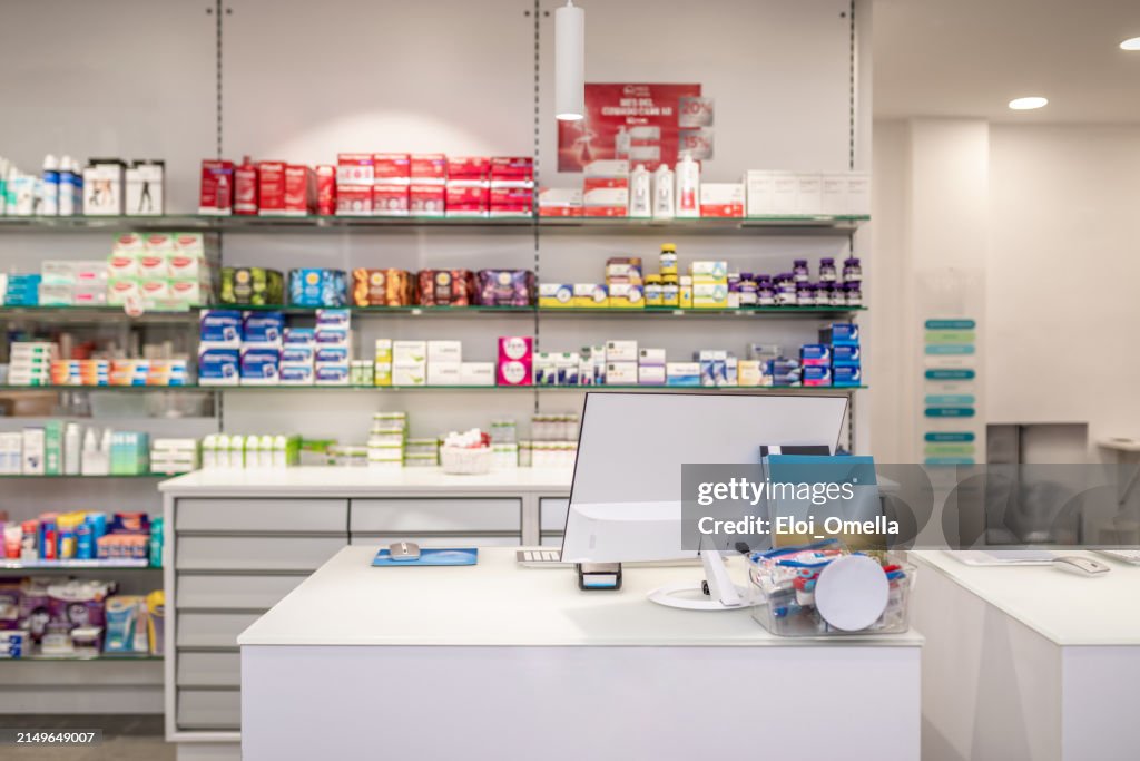 Shelves with medicaments in pharmacy store