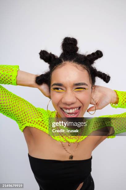 gen z teen girl posing against white background - all hip hop models stock pictures, royalty-free photos & images