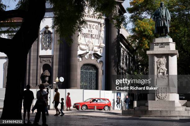 The statue to Joao Goncalves Zarco next to the Bank of Portugal during renovation work, on Largo da Restauracao, on 21st April 2024, in Funchal,...