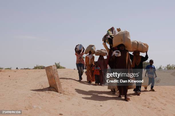Newly arrived refugees fleeing fighting in Darfur arrive at the border between Sudan and Chad on April 22, 2024 in Adre, Chad. Since the beginning of...