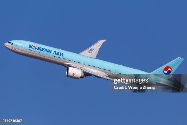 A Korean Air Lines Boeing 777-300ER passenger plane departing New York John F. Kennedy International Airport