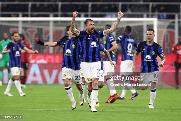 Francesco Acerbi of FC Internazionale celebrates scoring his team's first goal during the Serie A TIM match between AC Milan and FC Internazionale at...
