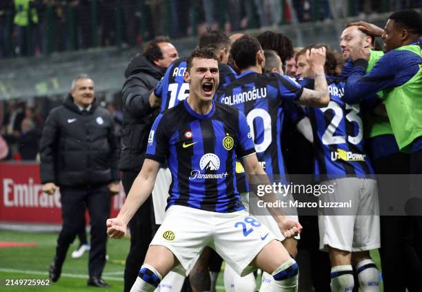 Benjamin Pavard of FC Internazionale celebrates his team's second goal scored by Marcus Thuram during the Serie A TIM match between AC Milan and FC...