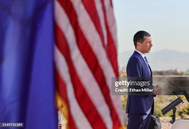Secretary of Transportation Pete Buttigieg is interviewed before a groundbreaking ceremony at the Brightline West Las Vegas station on April 22, 2024...