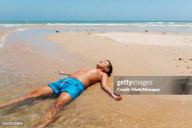 Bot Sunbaking 2,681 Boy Sunbathing Stock Photos, High-Res Pictures, and Images ...