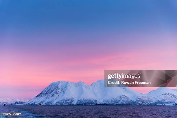 sunset over mountains, tromso, norway - polar climate stock pictures, royalty-free photos & images