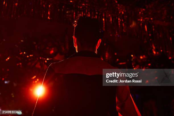 back of drag king stepping onto stage - backstage stock pictures, royalty-free photos & images