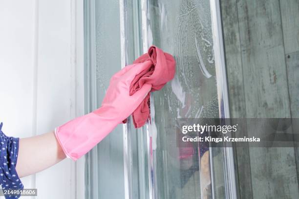 cleaning shower door - dirty shower room stock pictures, royalty-free photos & images