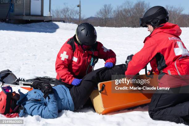 ski patrol at work - rescue stock pictures, royalty-free photos & images