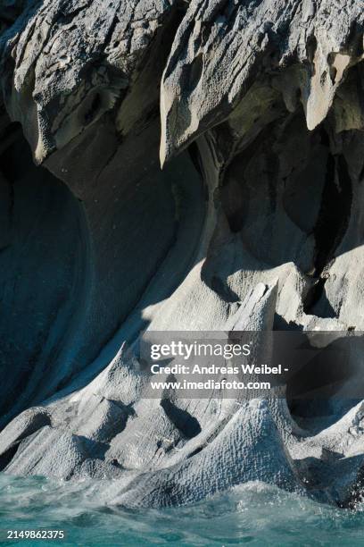 between fangs - stalactite stock pictures, royalty-free photos & images