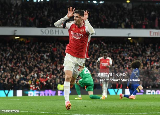 Kai Havertz of Arsenal celebrates scoring his team's third goal during the Premier League match between Arsenal FC and Chelsea FC at Emirates Stadium...