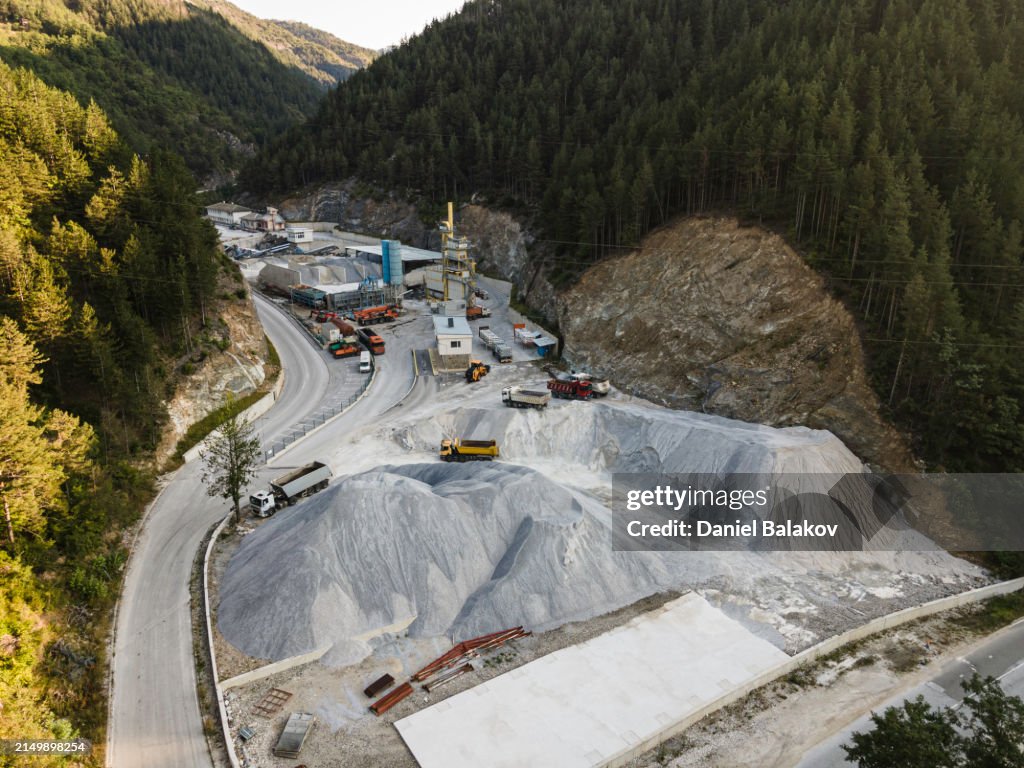 Building new mountain roads. Aerial view. Construction, transport and industry.
