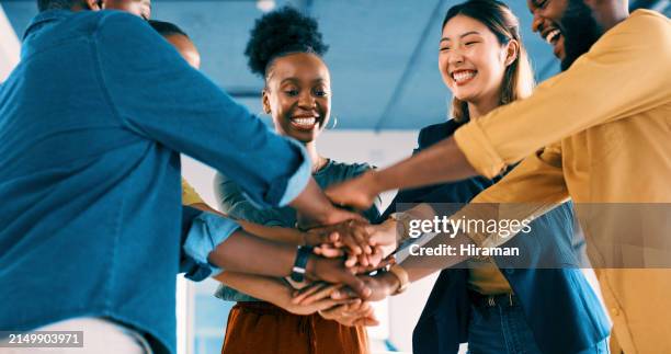 teamwork, employees and hands with smile for support, group and collaboration for motivation with businesspeople. team building, career and goals in office, partnership or cooperation in workplace - celebrate diversity stock pictures, royalty-free photos & images