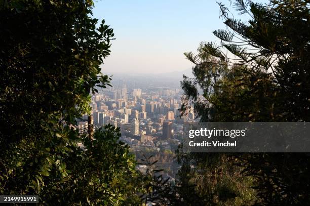 view of santiago from san cristóbal hill - cerro san cristóbal chile fotografías e imágenes de stock