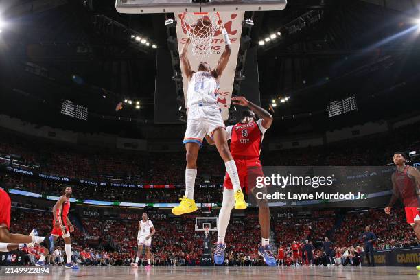 Aaron Wiggins of the Oklahoma City Thunder dunks the ball during the game against the New Orleans Pelicans during Round 1 Game 3 of the 2024 NBA...