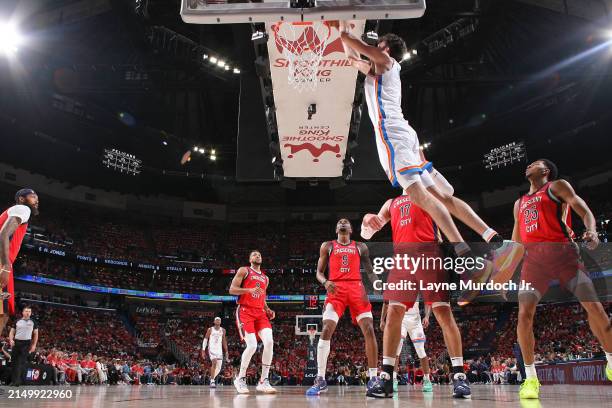 Chet Holmgren of the Oklahoma City Thunder dunks the ball during the game against the New Orleans Pelicans during Round 1 Game 3 of the 2024 NBA...
