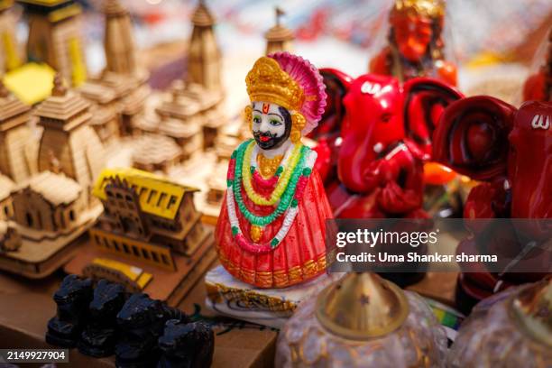 beautiful religious decorative items for sale at a local flea market. - shiva stock pictures, royalty-free photos & images