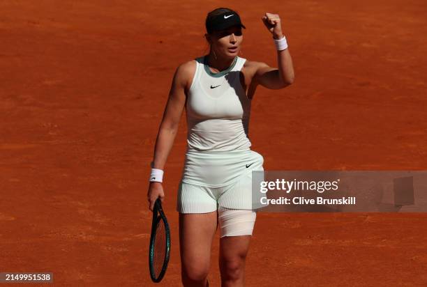 Paula Badosa of Spain celebrates a point in her match against Jessica Bouzas Maneiro of Spain on Day Two of the Mutua Madrid Open at La Caja Magica...