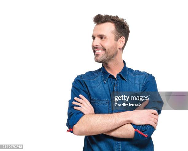 portrait of happy man wearing jeans shirt - profilo vista laterale foto e immagini stock
