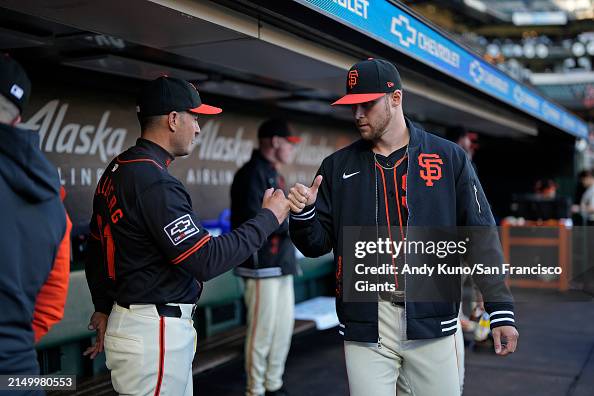 Landen Rouop Landen Roupp and Mark Hallberg of the San Francisco Giants prepare ...