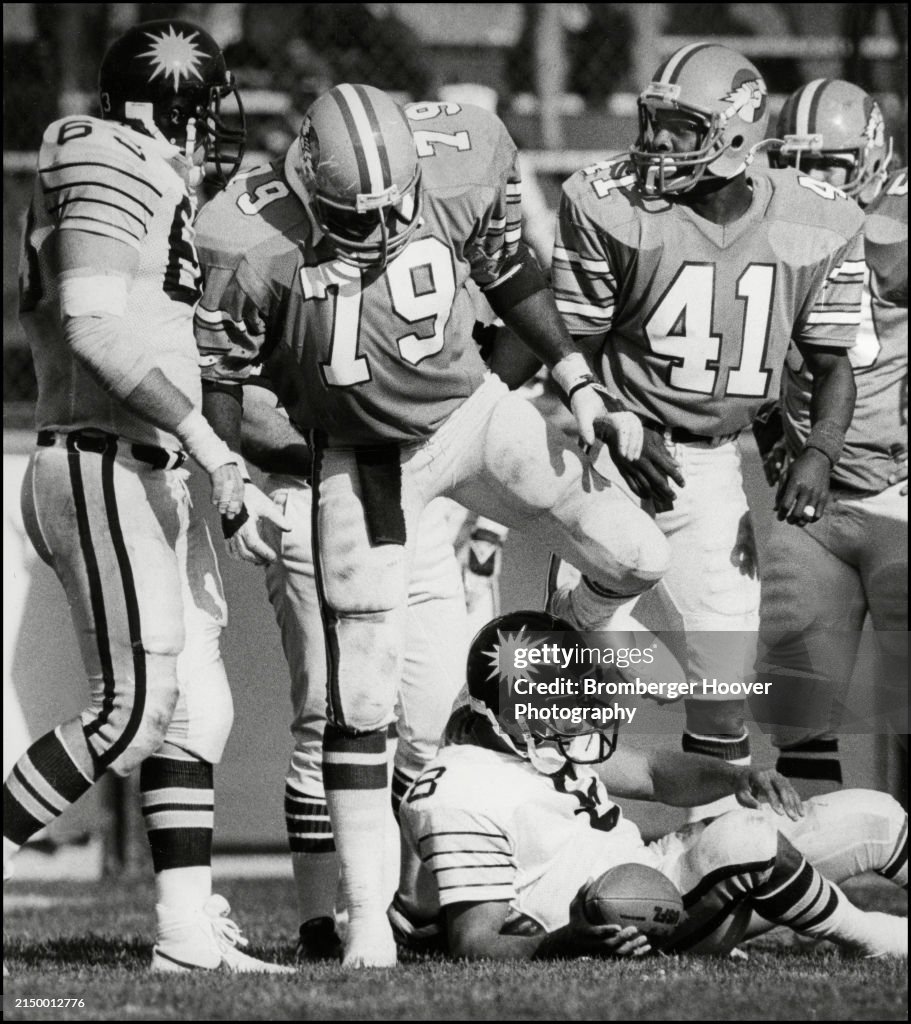 Oakland Invaders' Andre Hines Steps Over An Opponent