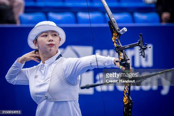 In this handout image provided by the World Archery Federation, Lim Sihyeon of Korea during the Women's recurve finals during the Hyundai Archery...