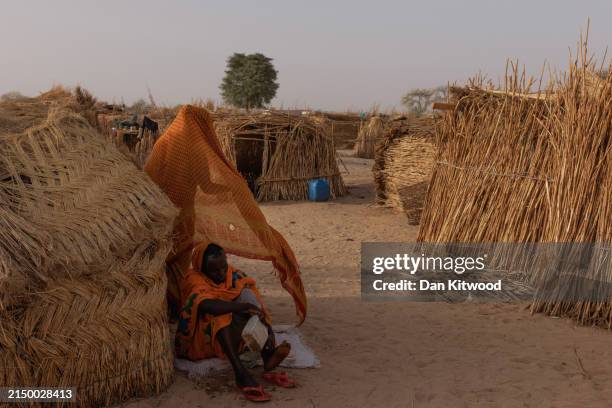 Sudanese women outside their shelters at the Ambelia refugee camp on April 24, 2024 in Adre, Chad. Since the beginning of the recent conflict between...