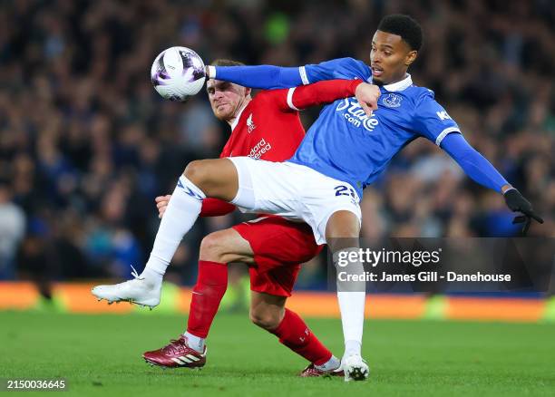 Youssef Chermiti of Everton battles for possession with Alexis Mac Allister of Liverpool during the Premier League match between Everton FC and...