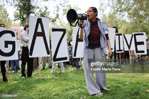 Pro-Palestine demonstrators rally at an encampment in support of Gaza at the University of Southern California on April 24, 2024 in Los Angeles,...