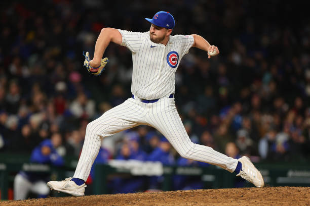 Luke Little of the Chicago Cubs delivers a pitch against the Houston Astros during the seventh inning at Wrigley Field on April 24, 2024 in Chicago,...