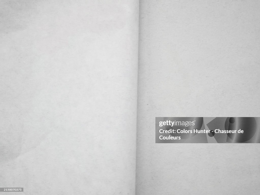 Close-up of white and empty pages of an open book. Natural light. Full frame 4:3. Black and white.
Paris, France.