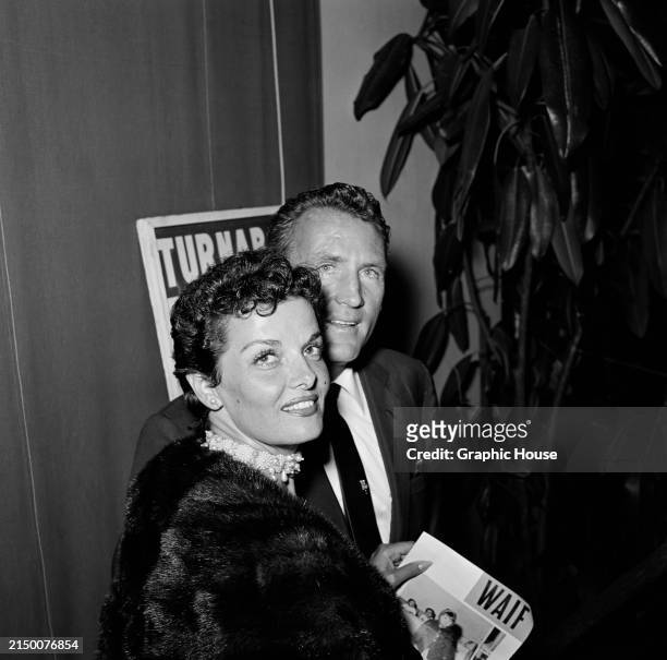 American actress Jane Russell and her husband, American football player Bob Waterfield attend a charity benefit, at the Turnabout Theatre in the...
