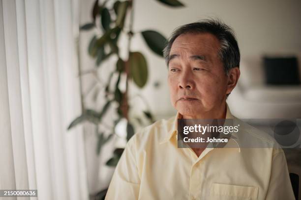 portrait of a pensive senior man - blank expression stock pictures, royalty-free photos & images