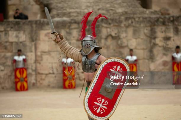 Tunisians gather at the Amphitheater of El Djem for the 'Thysdrus Rome Days' Festival in El Djem in Mahdia Governorate south of Tunis, Tunisia on...