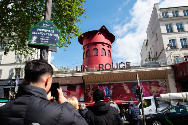 FRA: Windmill Blades Fall From Moulin Rouge, Paris Cabaret Club