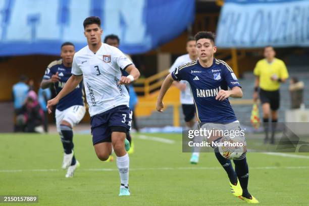 Daniel Ruiz of Millonarios F.C. And Guillermo Guzman of Boyaca Chico fight for the ball during the match on date 19 as part of the BetPlay DIMAYOR I...
