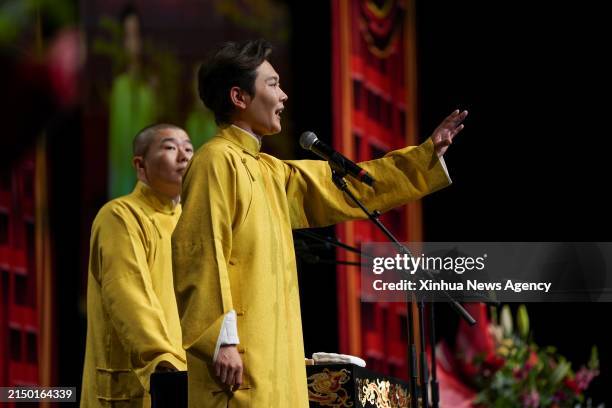 Meng Hetang R and Zhou Jiuliang perform Xiangsheng, or crosstalk comedy in London, Britain, April 27, 2024. Thunderous laughter and applause almost...