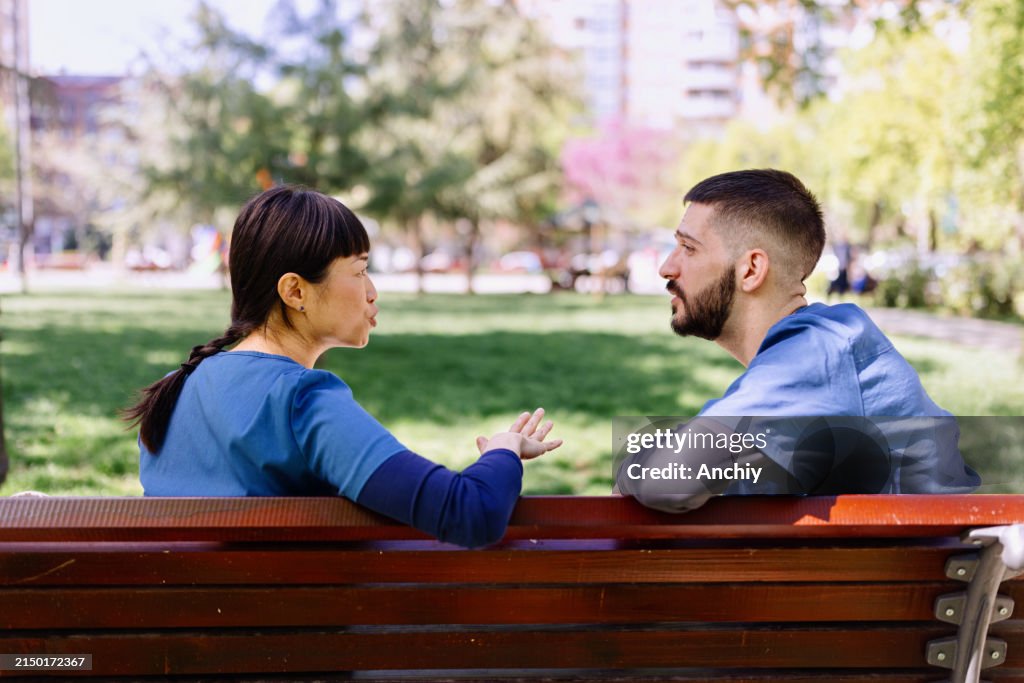 Male and female nurse talking about something