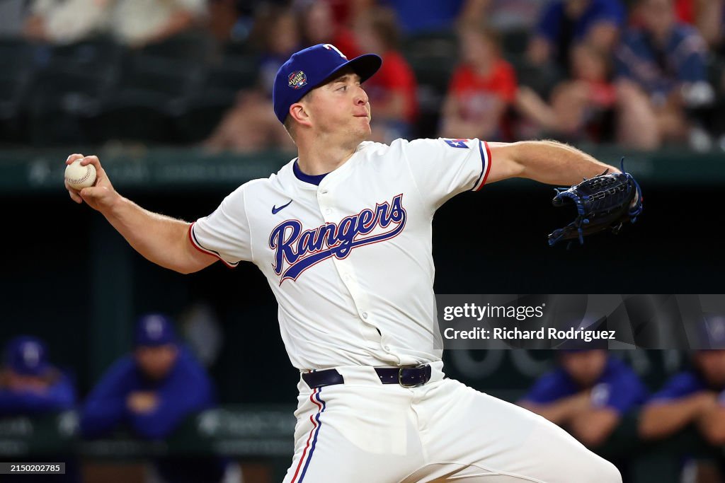 Josh Sborz of the Texas Rangers pitches in the ninth inning against ...