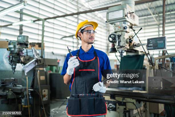 Stock Machine Operator 234 Heavy Machine Operator Stock Photos, High-Res Pictures, and Images ...